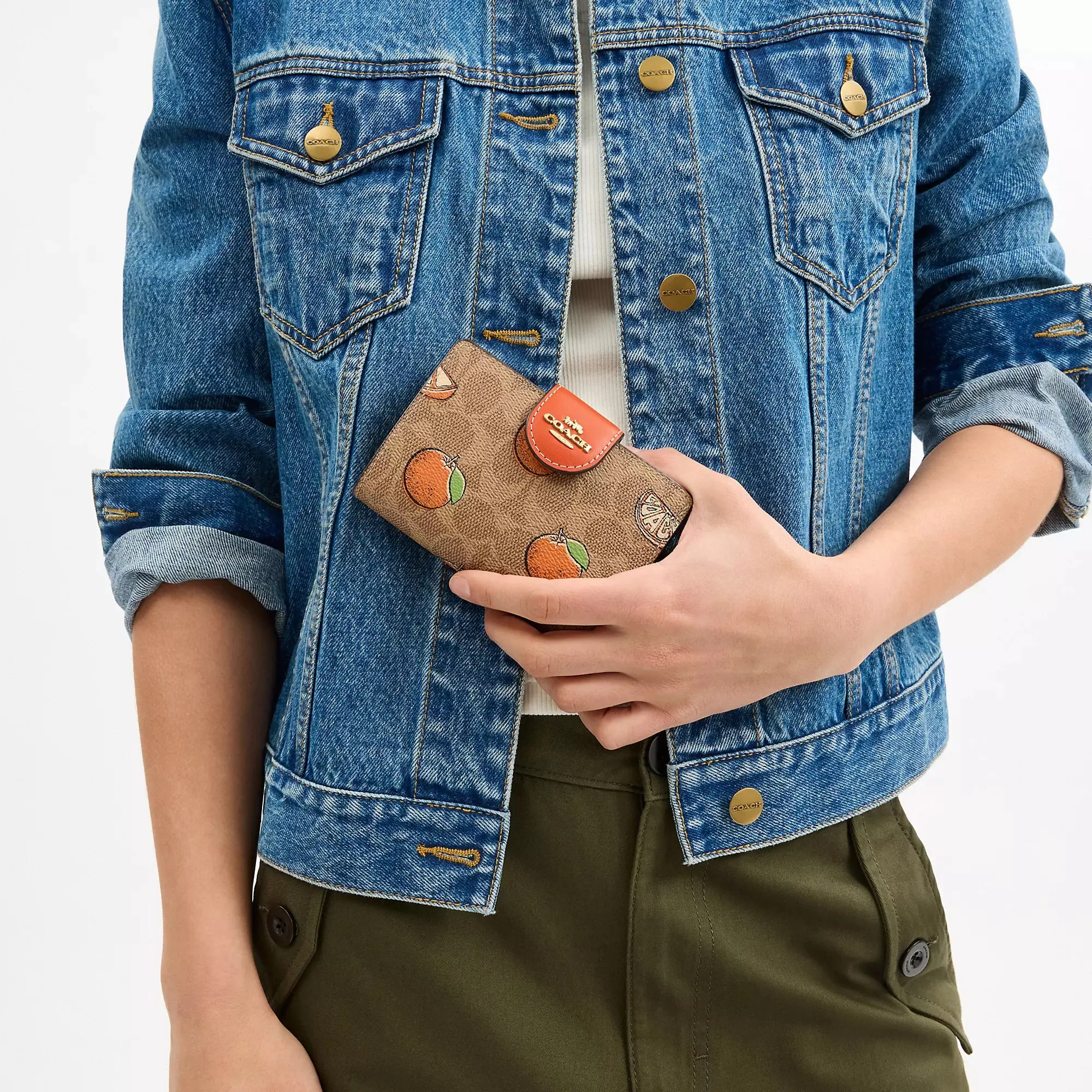 Coach Outlet Medium Corner Zip Wallet In Signature Canvas With Orange Print