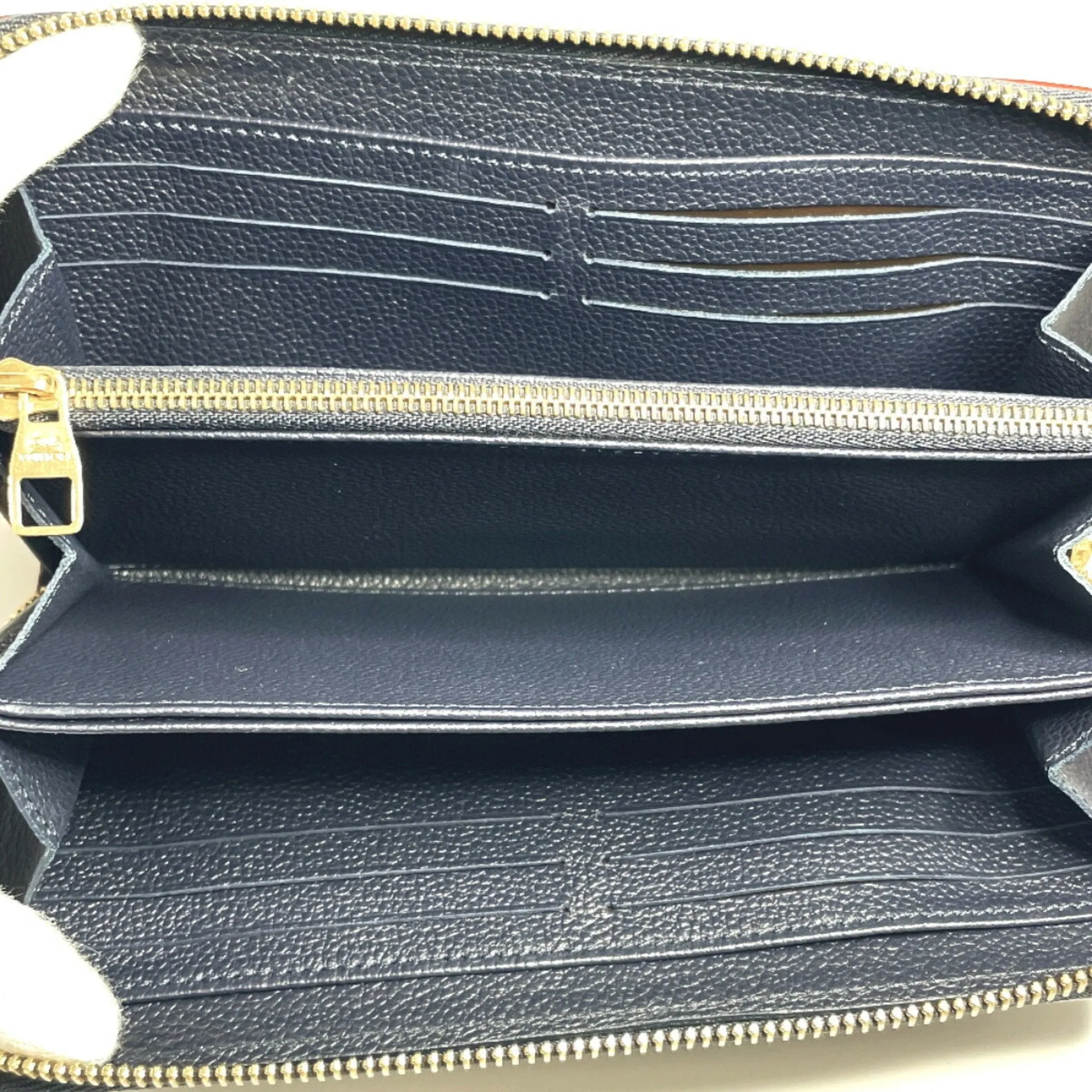 Louis Vuitton Monogram Empreinte Marine Rouge Navy Monogram Empreinte Long Wallet (Bi-Fold) (Pre-Owned)