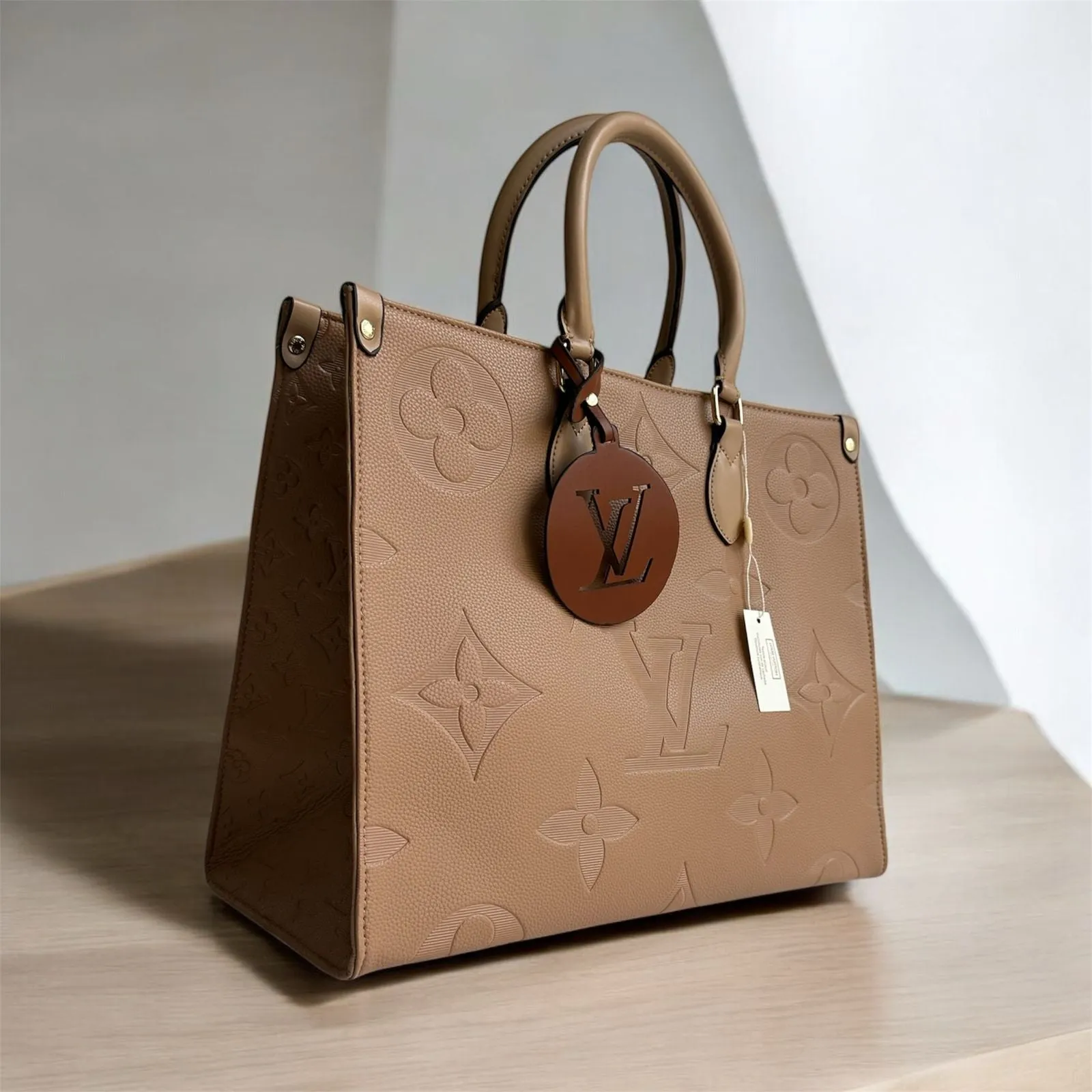 LOUIS VUITTON ON THE GO MONOGRAM TOTE BAG